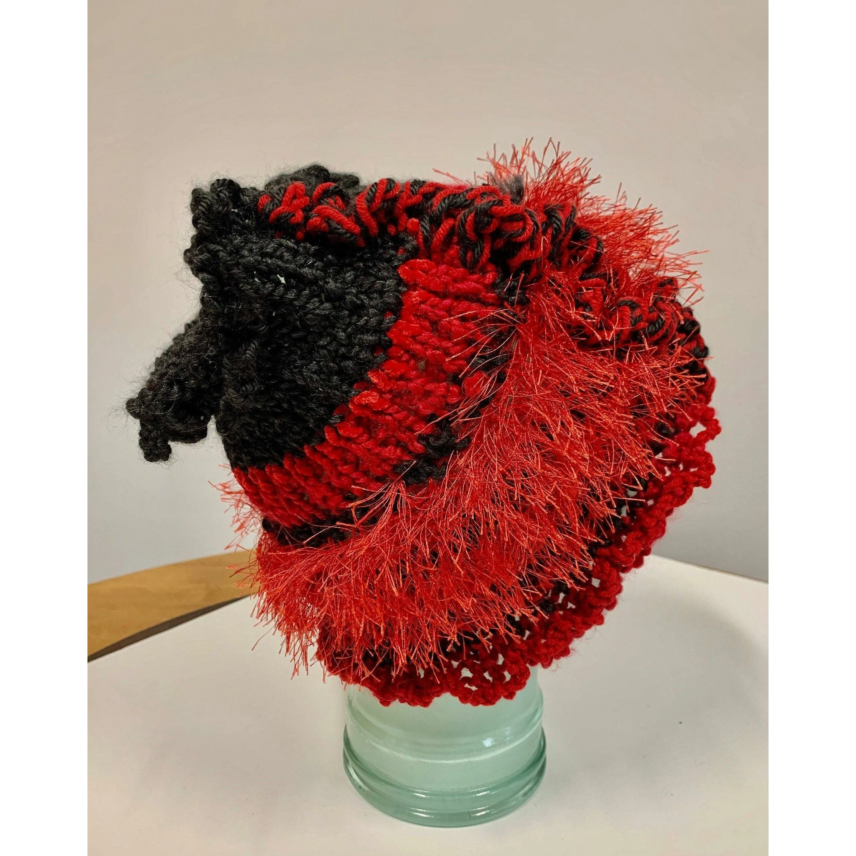 Hand knit shades of Red soft infinity scarf or Head band hat adornment with multiple stitch and color textures. Non wool.