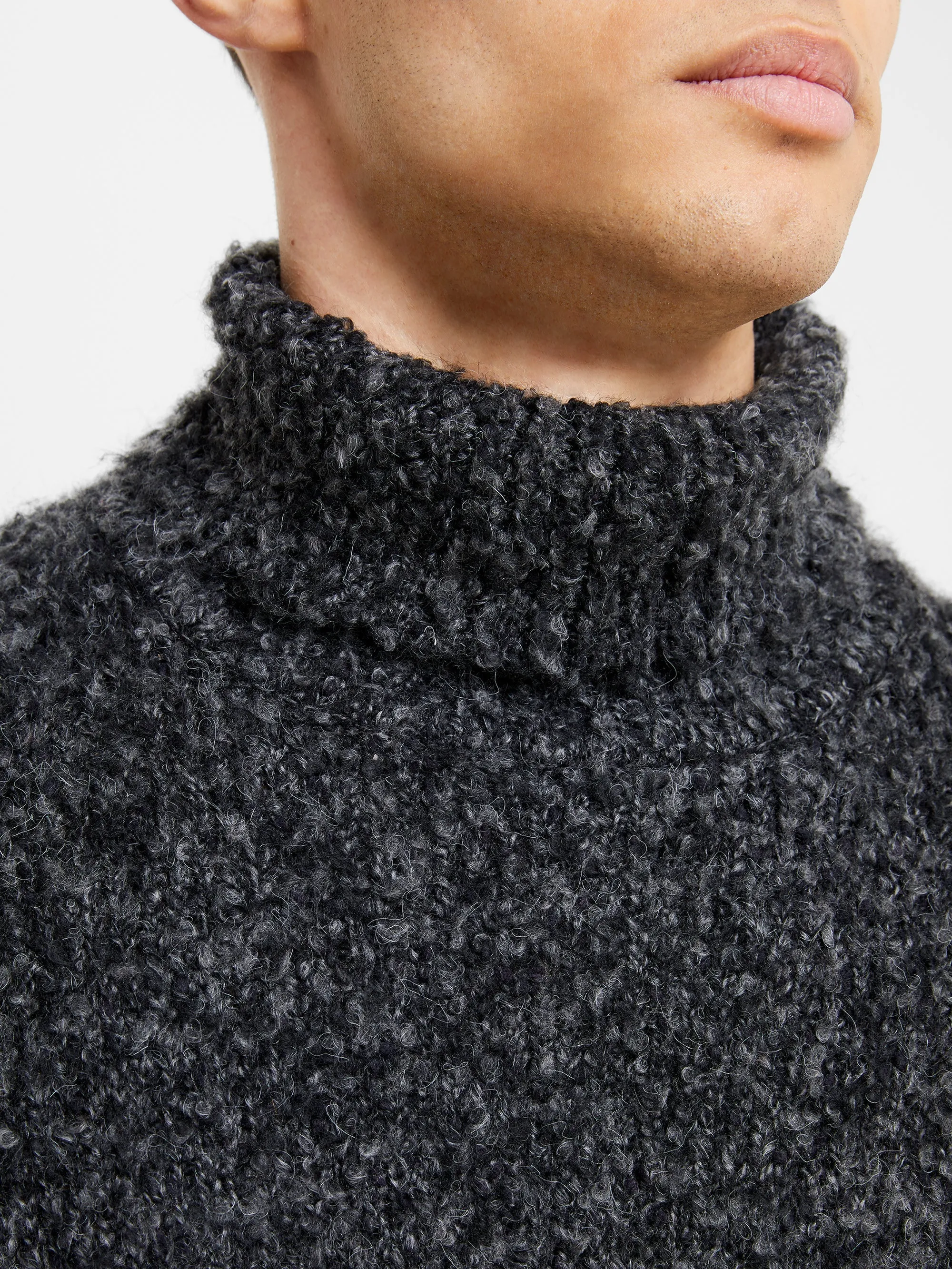 Twisted Boucle Roll Neck Jumper